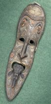 A VINTAGE AFRICAN TRIBAL WOODEN MASK