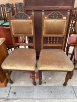 A PAIR OF LATE VICTORIAN OAK DINING CHAIRS