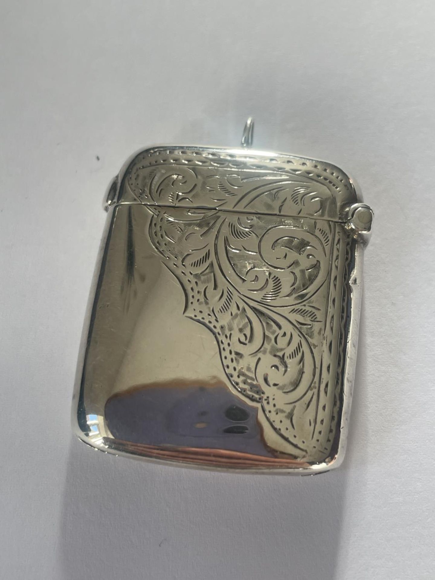 A SILVER VESTA CASE