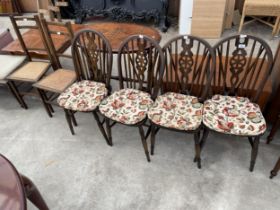 A SET OF FOUR ELM AND BEECH WHEELBACK WINDSOR STYLE CHAIRS AND A PAIR OF BEDROOM CHAIRS
