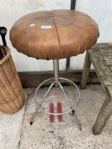 A RETRO METAL BAR STOOL