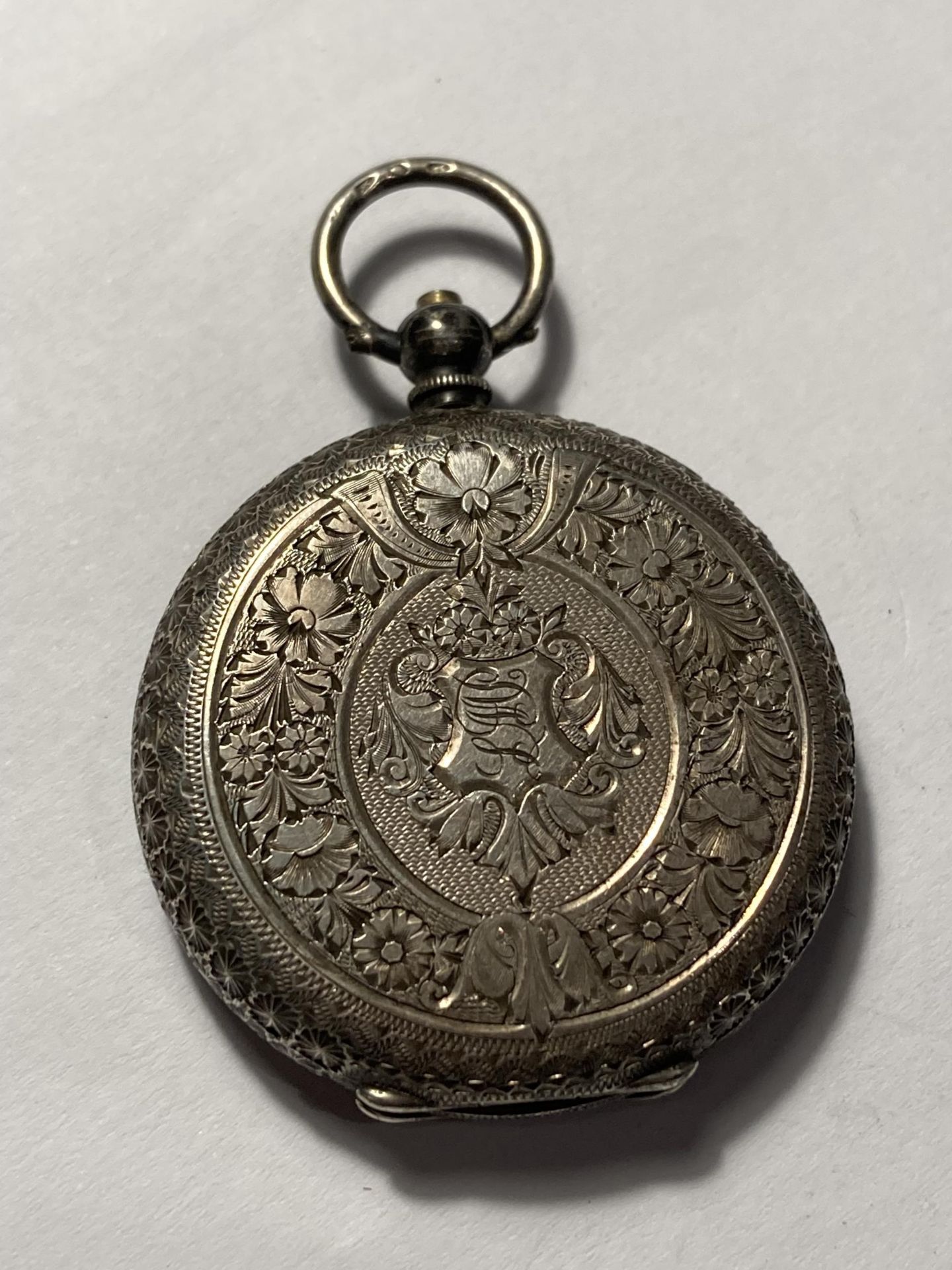 A LADIES SILVER FOB WATCH WITH DECORATIVE FACE - Image 2 of 3