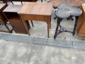 A HEAVILY CARVED OAK TWO TIER OCCASIONAL TABLE WITH CLOVER LEAF SHAPED TOP, SEWING MACHINE TABLE AND