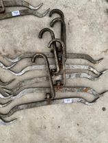 A SET OF FIVE STAINLESS STEEL BUTCHERS ABATOIR HOOKS