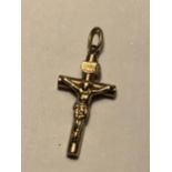 A 9 CARAT GOLD CRUCIFIX GROSS WEIGHT 0.54 GRAMS