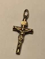 A 9 CARAT GOLD CRUCIFIX GROSS WEIGHT 0.54 GRAMS