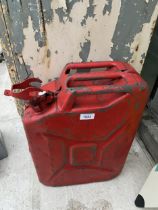 A VINTAGE RED METAL JERRY CAN