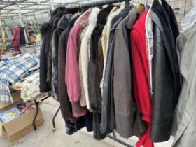 A LARGE ASSORTMENT OF LADIES AND GENTS COATS