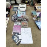 A LARGE ASSORTMENT OF CRAFTING ITEMS TO INCLUDE PAPER, STICKERS AND A HOBBYCRAFT PRINTER ROLLER ETC