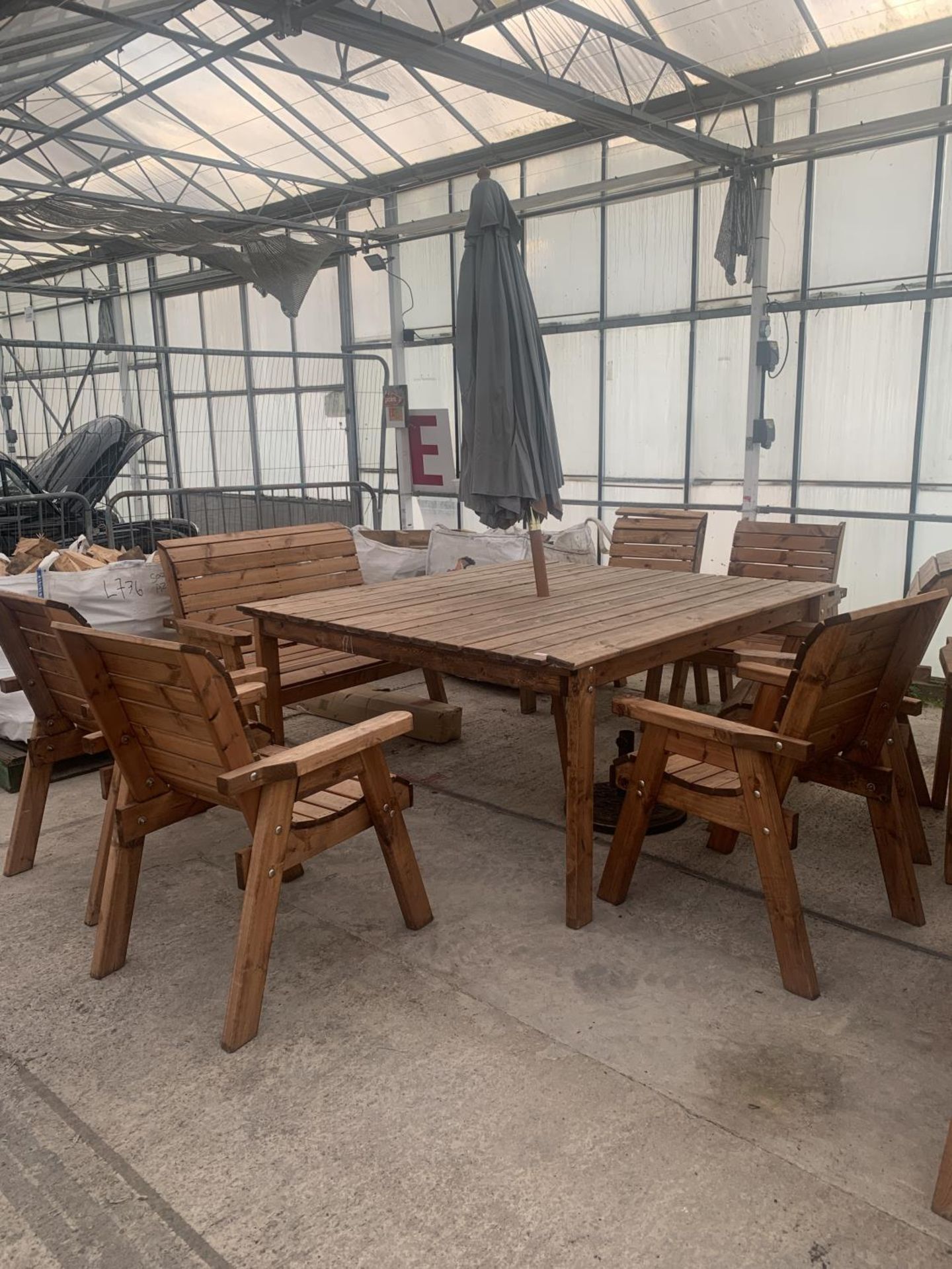 A CHARLES TAYLOR AS NEW AND USED EX DISPLAY LARGE 8 SEATER TABLE WITH SIX CHAIRS AND A TWO SEATER