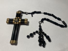 A CROSS TO BEAR MOURNING PENDANT