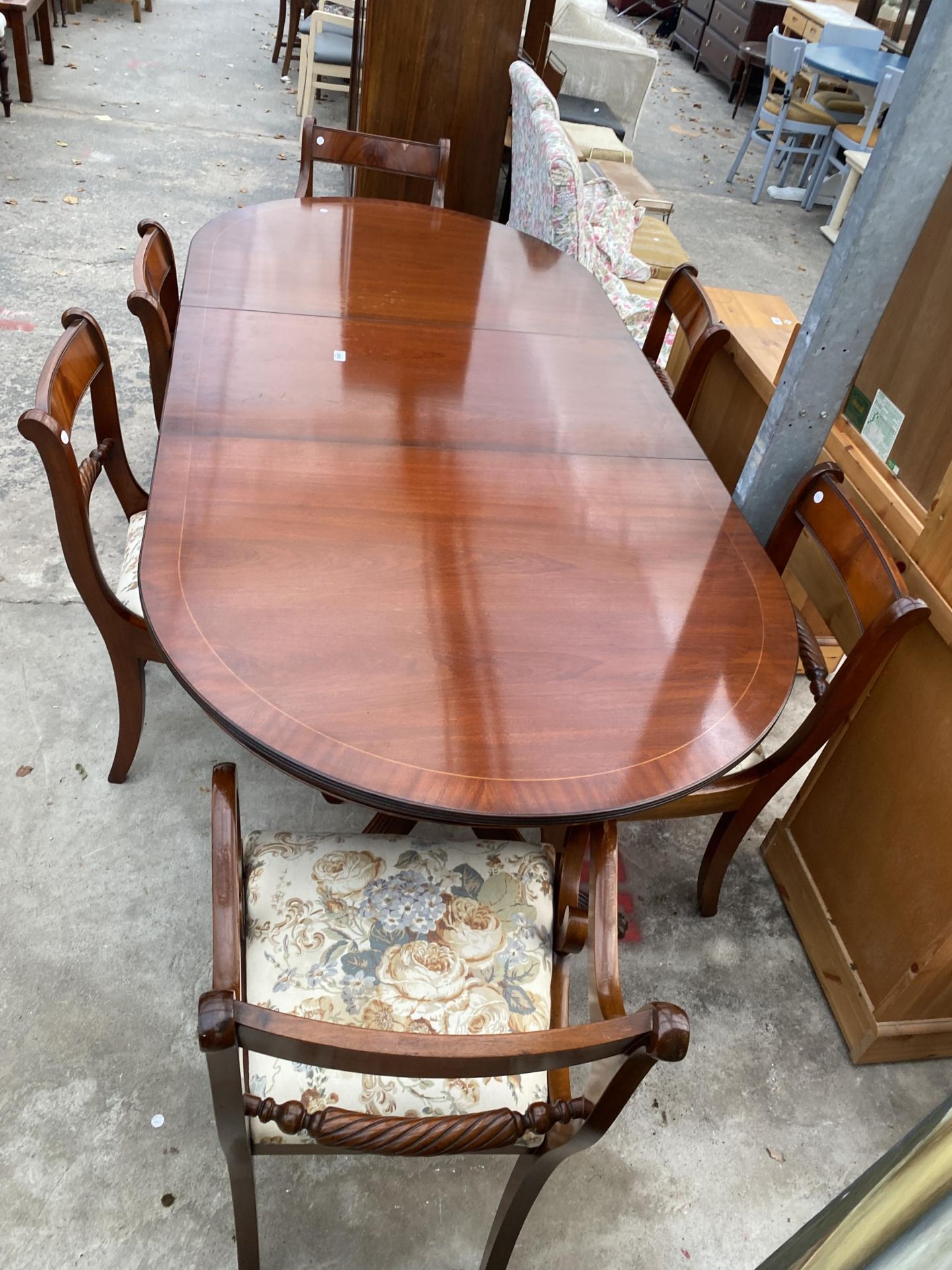 A MAHOGANY REGENCY STYLE TWIN PEDESTAL EXTENDING DINING TABLE, 64 X 39" (LEAF 20") AND SIX ROPE BACK - Image 3 of 7