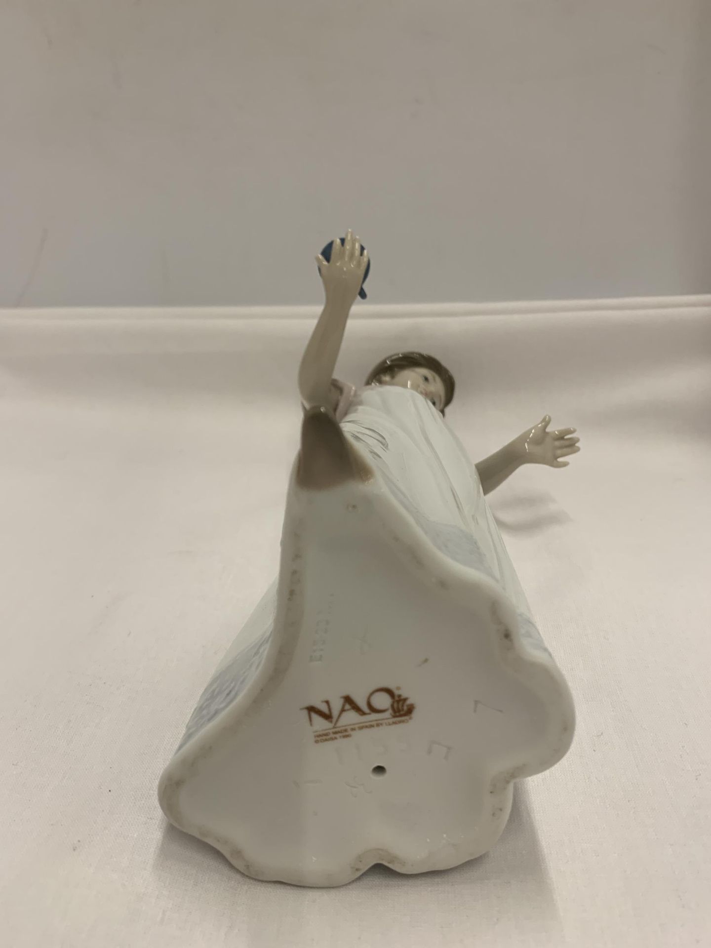 A NAO FIGURE OF A GIRL HOLDING A CANDLE - Image 5 of 5
