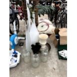 AN ASSORTMENT OF GLASS VASES AND THREE DEMI JOHNS ETC