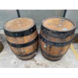 A PAIR OF MINIATURE WOODEN AND METAL BANDED BARRELS (H:45CM)
