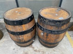 A PAIR OF MINIATURE WOODEN AND METAL BANDED BARRELS (H:45CM)