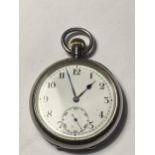 A SILVER POCKET WATCH WITH WHITE ENAMEL FACE SEEN WORKING BUT NO WARRANTY