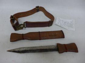 A KENYAN MAU MAU KNIFE, CIRCA 1952, 27CM DOUBLE EDGE BLADE, WOODEN GRIP AND SCABBARD, BRITISH