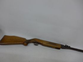 A VINTAGE BSF S54 .177 CALIBRE AIR RIFLE, 49CM BARREL, LENGTH 116CM, TOGETHER WITH SLIP CASE