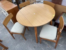 A RETRO 41" DIAMETER DROP LEAF KITCHEN TABLE AND FOUR CHAIRS