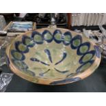 A LARGE STUDIO POTTERY BOWL, SIGNED 'HANNIE' TO THE BASE, DIAMETER 40CM