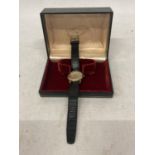 A VINTAGE LONGINES GENTLEMAN'S WRIST WATCH WITH 9 CARAT GOLD CASE, SILVERISED DIAL AND ORIGINAL CASE