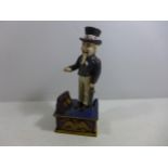 A PAINTED CAST IRON UNCLE SAM MONEY BOX, HEIGHT 27CM