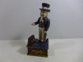 A PAINTED CAST IRON UNCLE SAM MONEY BOX, HEIGHT 27CM