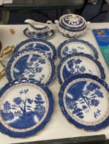 A QUANTITY OF BOOTH'S 'REAL OLD WILLOW' PATTERN PLATES, SAUCE BOAT AND SAUCER AND A LIDDED TUREEN
