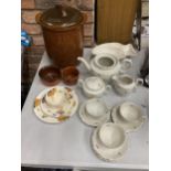 A GERMAN TEASET TO INCLUDE A TEAPOT - NO LID - A CREAM JUG, SUGAR BOWL, CUPS AND SAUCERS, A FLORAL