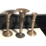 THREE HALLMARKED SILVER CANDLESTICKS TO INCLUDE A PAIR ALL WITH WEIGHTED BASES