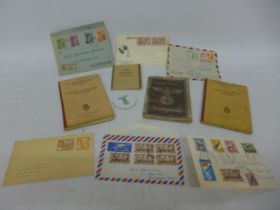 A COLLECTION OF WORLD WAR II EPHEMERA TO INCLUDE A NAZI GERMANY IDENTITY BOOK, AIR RAID