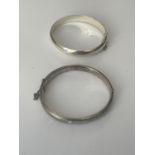 TWO SILVER BANGLES