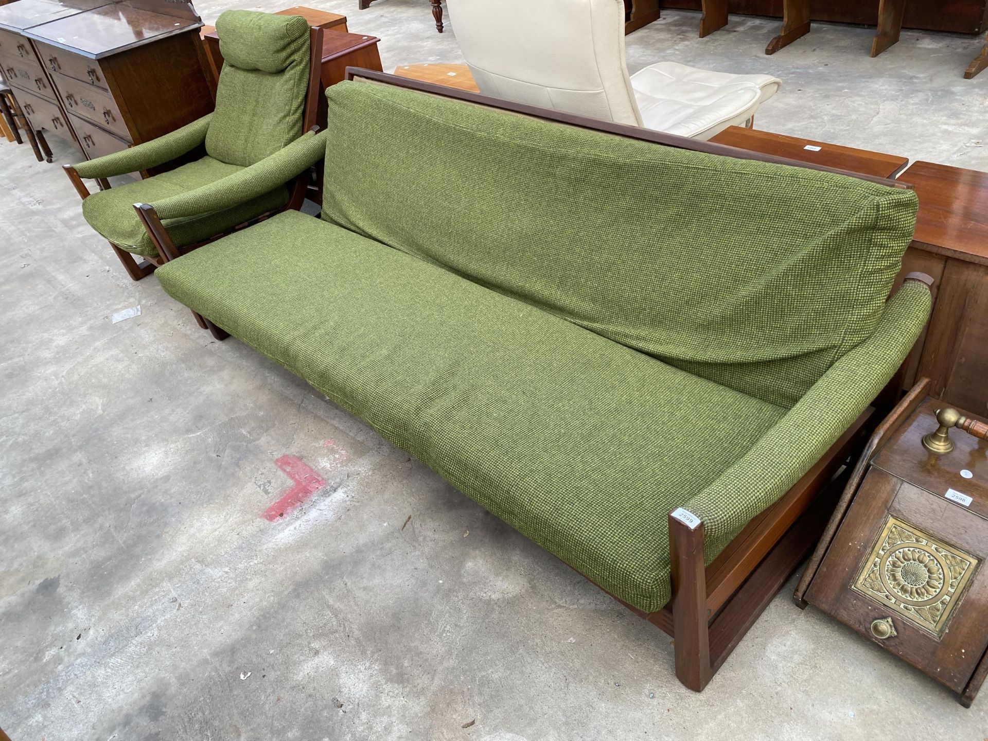 A MID 20TH CENTURY AMFROSIA WOOD SOFA BED