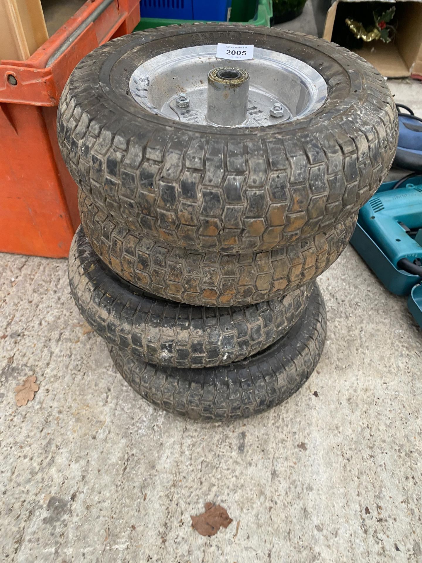 FOUR TROLLEY WHEELS AND TYRES