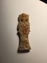 AN ORIENTAL CARVED FIGURE