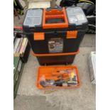 A TWO WHEELED STACKING TOOL BOX AND AN ASSORTMENT OF TOOLS TO INCLUDE PLIERS AND HAMMERS ETC