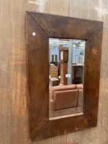 A MODERN WALL MIRROR IN LEATHER FRAME WITH BEVEL EDGE, 36 X 24"