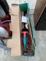 A BOSCH ELECTRIC HEDGE TRIMMER