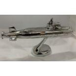A CHROME MODEL OF A SUBMARINE ON STAND, HEIGHT 19.5CM