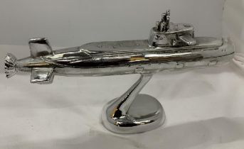A CHROME MODEL OF A SUBMARINE ON STAND, HEIGHT 19.5CM
