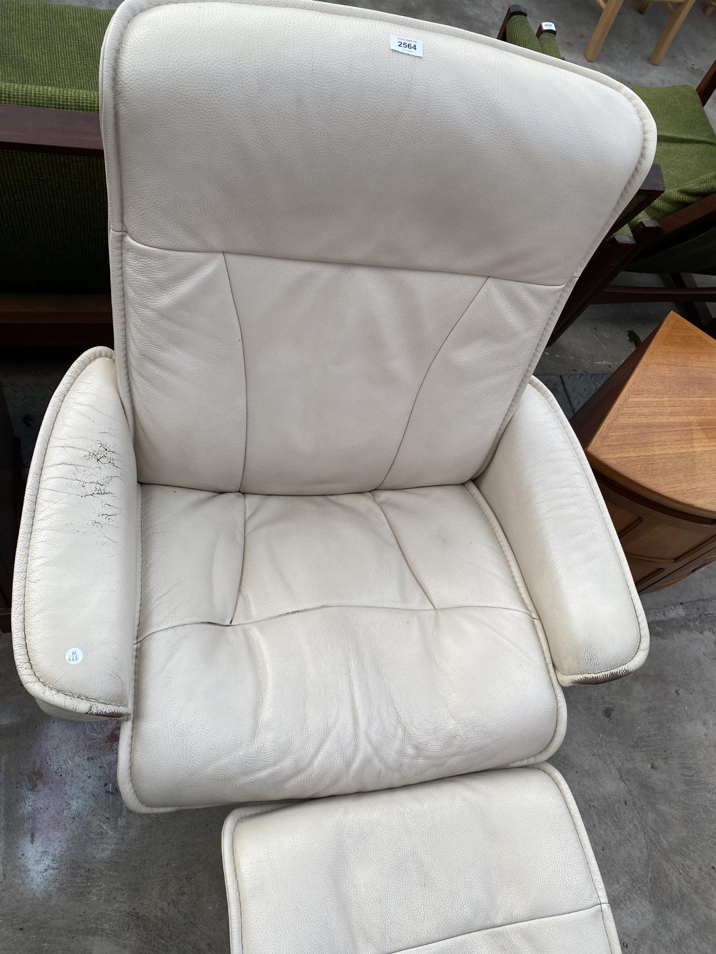 A STRESSLESS RECLINING SWIVEL CHAIR AND MATCHING STOOL - Image 3 of 3
