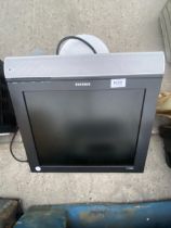 A SAMSUNG 17" TELEVISION WITH WALL MOUNTING