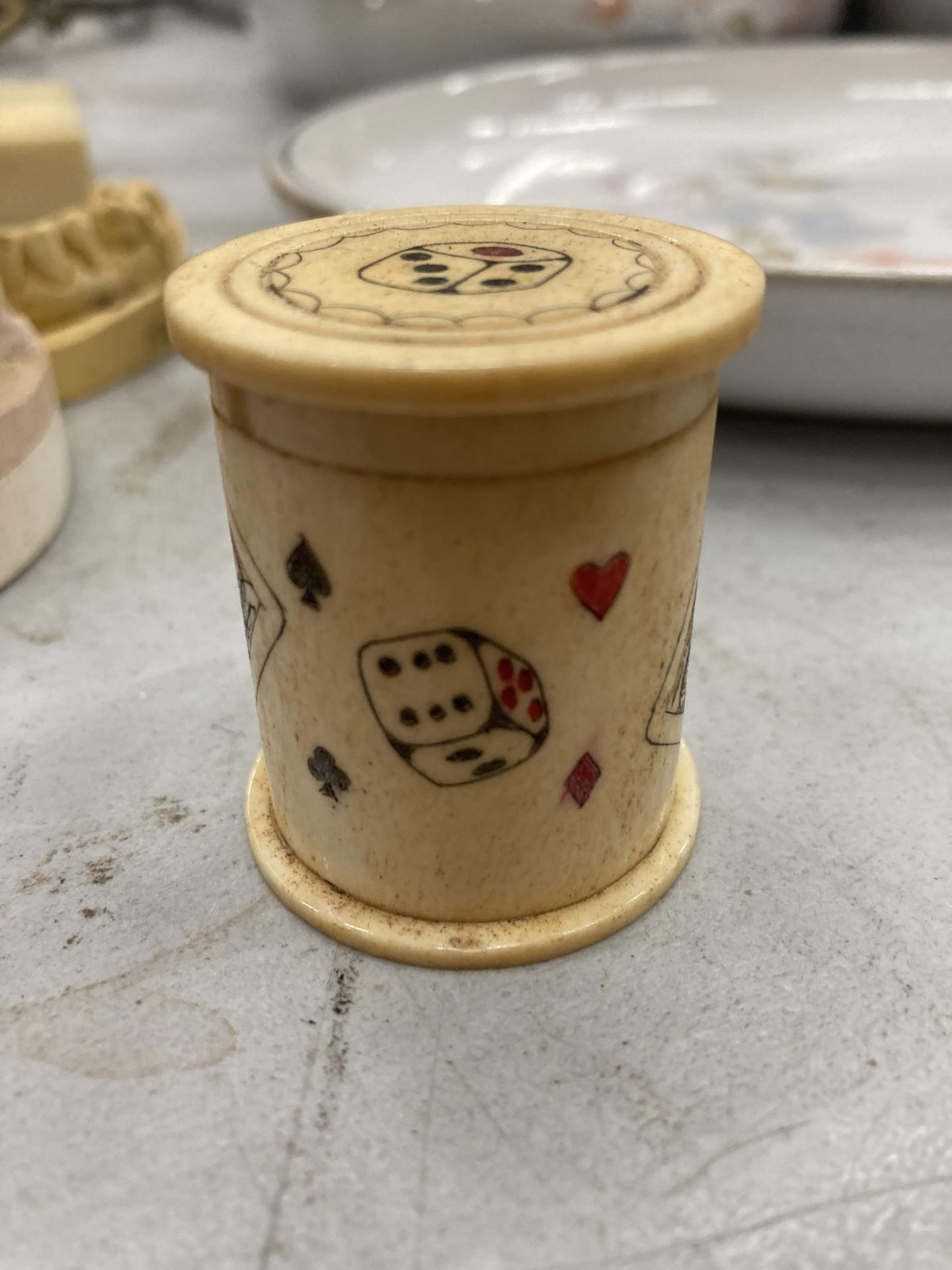 A BONE DICE HOLDER / SHAKER