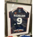 A FRAMED AND GLAZED SPORTS TOP, POSSIBLY SWINTON LIONS RUGBY, A/F TO THE GLASS, WITH NICHOLSON NAME