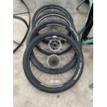 TWO PAIRS OF MOUNTAIN BIKE WHEELS WITH DISC BRAKES