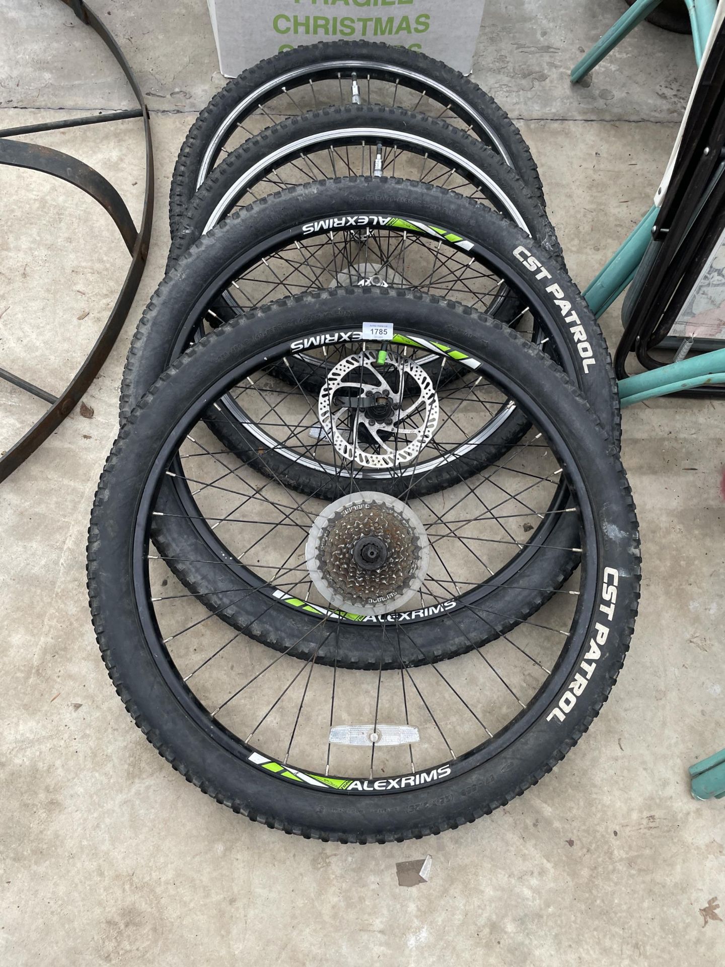 TWO PAIRS OF MOUNTAIN BIKE WHEELS WITH DISC BRAKES