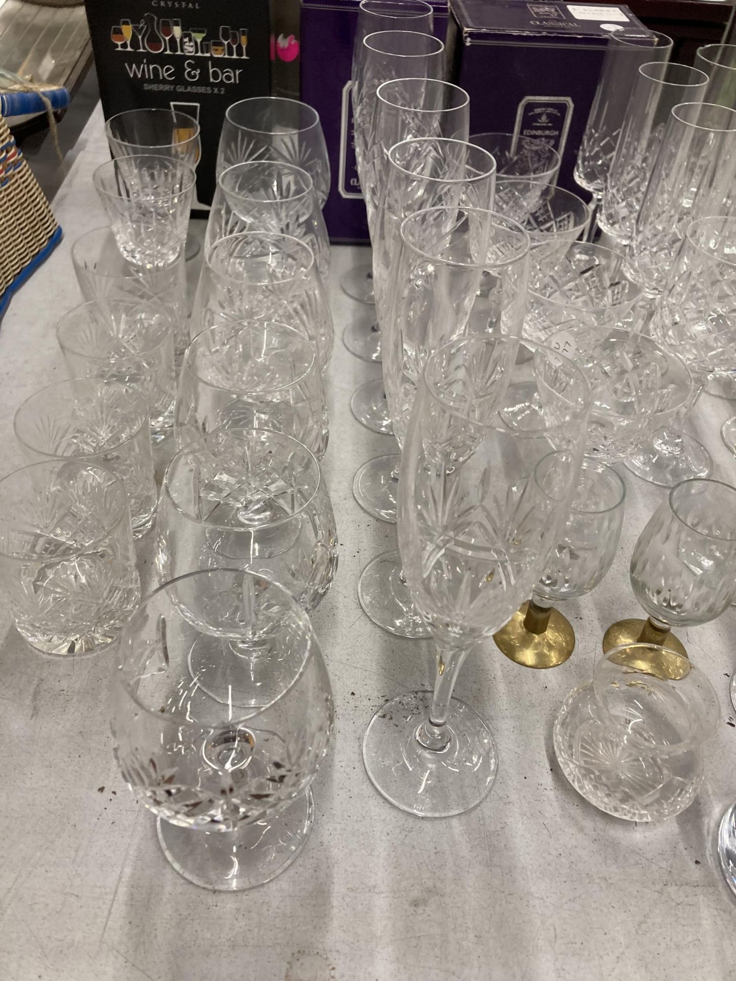 A VERY LARGE QUANTITY OF GLASSES, SOME CUT GLASS, TO INCLUDE CHAMPAGNE FLUTES, WINE, SHERRY, PORT, - Image 5 of 5