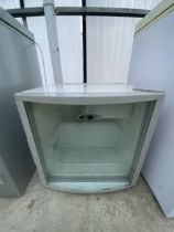 A WHITE COUNTER TOP GLASS FRONT DISPLAY FRIDGE