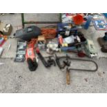 AN ASSORTMENT OF TOOLS TO INCLUDE A BOTTLE JACK, WELDING MASK AND BRACE DRILL ETC